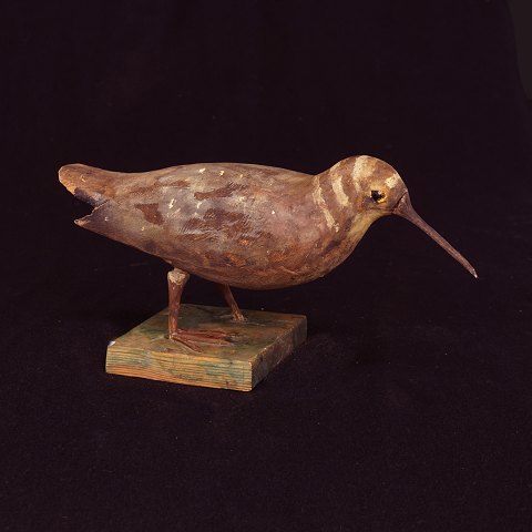 Swedish folkart: A bird, wood. Late 19th Century. 
H: 15cm. L: 32cm