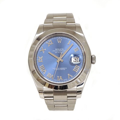 Rolex Oyster Perpetual Datejust Ref. 116300 with 
blue dial. Sold 14.03.2014. Box and  papers. Good 
condition with signs of use. D: 42mm