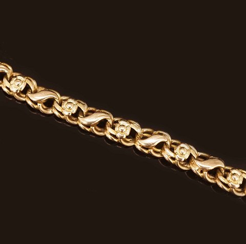 A 14kt gold Evald Nielsen Art Nouveau bracelet. L: 
18,5cm