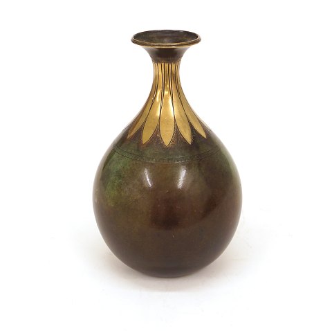 A partly polished Just Andersen, Denmark, bronze 
vase. #73. H: 21cm