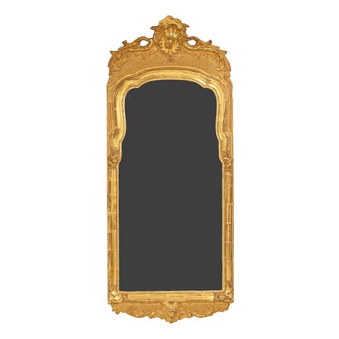 A gilt wood cut Rococo mirror. Denmark circa 1760. 
Measures: 120x51cm