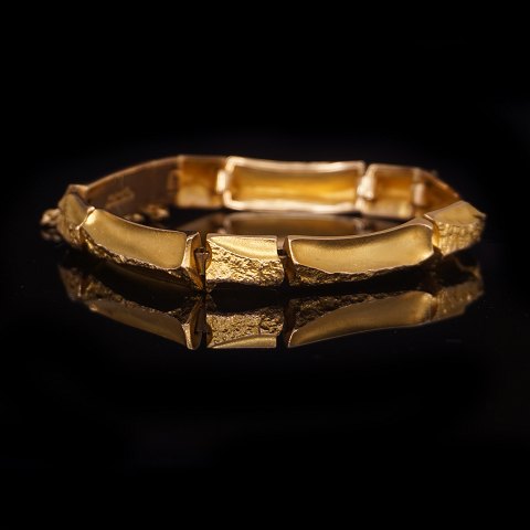 Lapponia 14kt gold bracelet. L: 19cm. W: 9mm. W: 
25gr