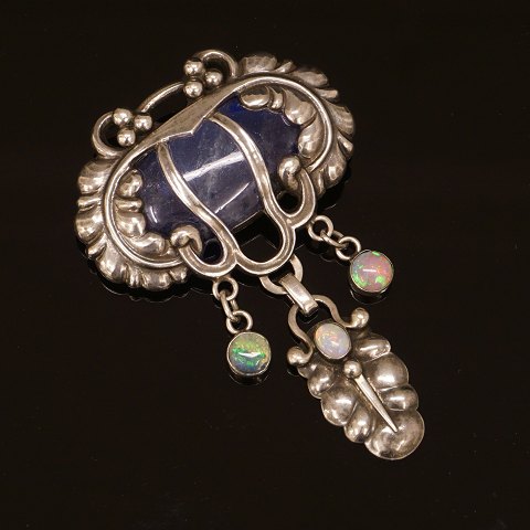 Sterlingsilver brooch by Kay Bojesen, 1886-1958, 
Denmark, 1913-20. Size: 5x7,5cm