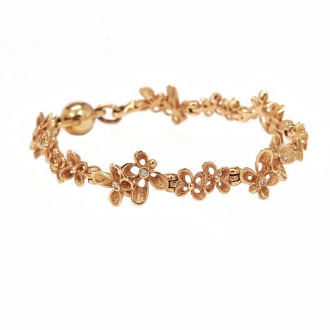 Per Borup Violina 14kt gold bracelet with 11 
diamonds. L: 17,5cm