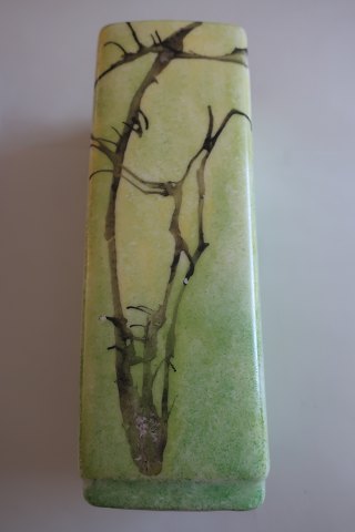 Vase made of chinaDecoration made by handL: 15cmIn a very good condition