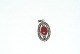 Silver pendant with carnival