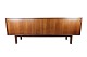 Sideboard in rosewood with sliding doors designed by Omann Junior from the 
1960s.
5000m2 showroom.
