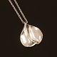 Hans Hansen Sterlingsilver pendant with a sterlingsiver necklace. L: 68cm. 
Pendant: 5,5x4,6cm