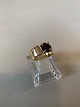 Ladies ring with inlaid smoke topaz in 14 Karat Gold
Size 64