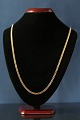Antik Huset 
presents: 
Necklace 
for men in 14 
carat gold with 
lobster clasp. 
Pattern; Armor 
facet
