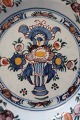 Antique Delft plate(s)3 rare alike handmadePolycrom decoratedDecorated with a vase with flowers decorated at the rim tooWith signatur1600-years- 1700-yearsDiam: 23cmIn a good condition,but with a little small cracks at the rim - We can send