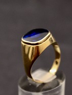 14 carat gold ring with sapphire colored gemstone