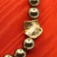 Ole Lynggaard; Clasp of 14k gold