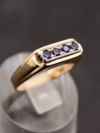 14 karat guldring  med sm safirer