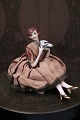 Decorative, old half-doll in porcelain from the 1930s with fine fabric clothing 
sitting with a bird...