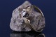 Damering i 9 karat rød- og hvidguld, med diamant. Stemplet T.A.D, 375, størrelse 
55.