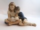 Royal Copenhagen. Porcelain figure. Children reading. Model 4670. Length 19.5 
cm. Height 13.5 cm. (1 quality)