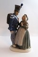 Royal Copenhagen. Porcelain figurine. Soldier and witch. Model 1112. Height 20 
cm. (4 quality)