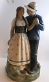 Royal Copenhagen. Porcelain figurine. Henrik & Else. Model 3049. Height 43 cm. 
(3 quality)
