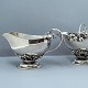 Georg Jensen; A set with sugar bowl and creamer of sterling silver, No 235 B