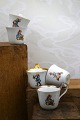 Bing & Grondahl high-handled cups with Christmas motifs 
and gold rim...