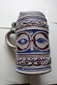 Antique mug 
with a lid of 
tin/pewter
Pottery
H: 17cm ...