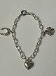 Armbånd med charms i sølv.Længde 15,7 cm.