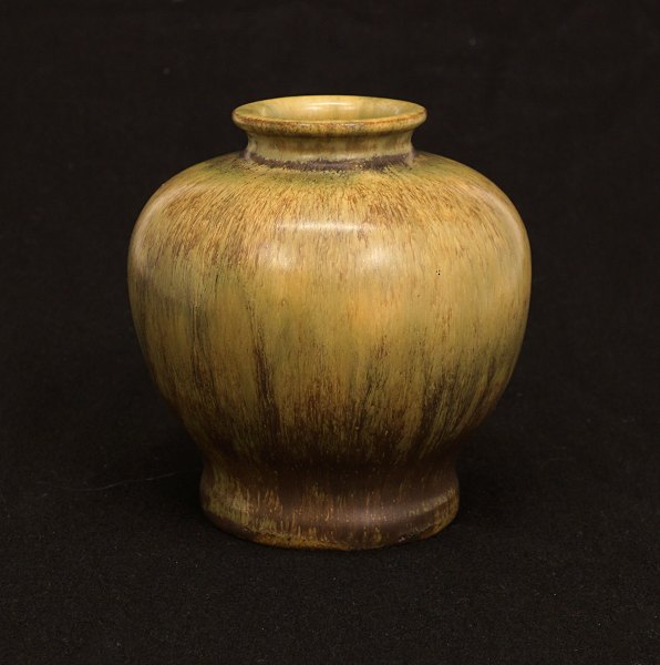 Patrick Nordström, 1870-1929, for Royal Copenhagen: Vase with green/brown glaze. 
Signed and dated 21-1-1922. H: 12,5cm