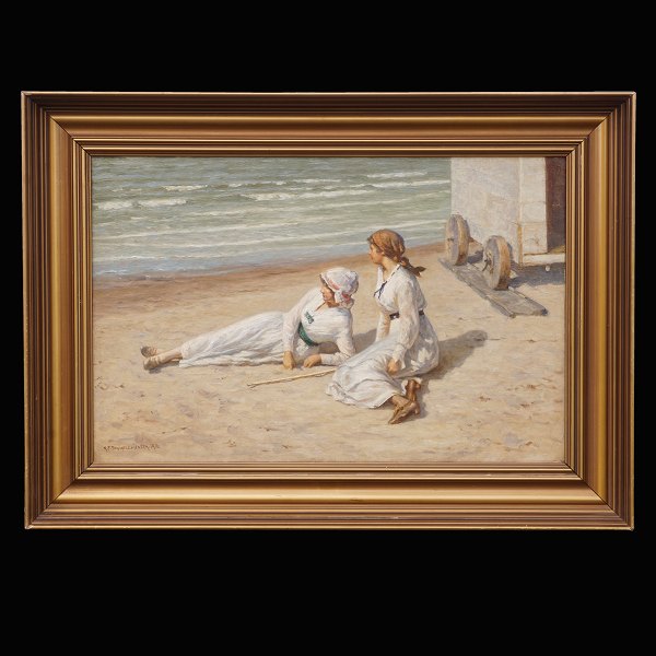 N. F. Schiøttz-Jensen, 1855-1941: To badepiger på stranden i Lønstrup. Olie på 
lærred. Signeret og dateret 1916. Lysmål: 39x60cm. Med ramme: 56x77cm