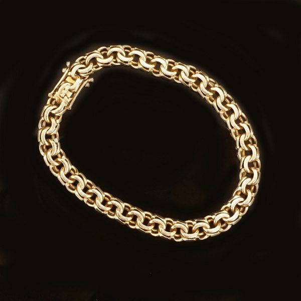 Kräftiges 14kt Gold Armband von Bremer Jensen, Randers, Dänemark. L: 19,5cm. B: 
7mm. G: 20gr