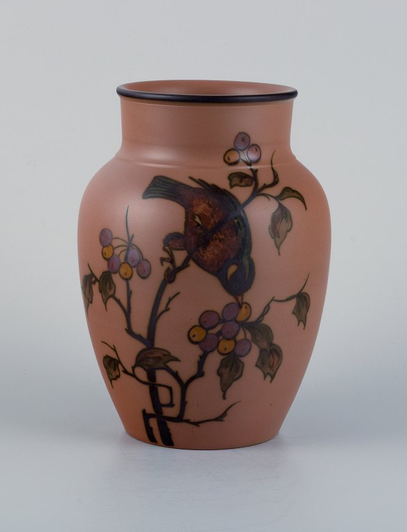 Hjorth Bornholm, Denmark, handmade ceramic vase decorated with a bird on a branch.
