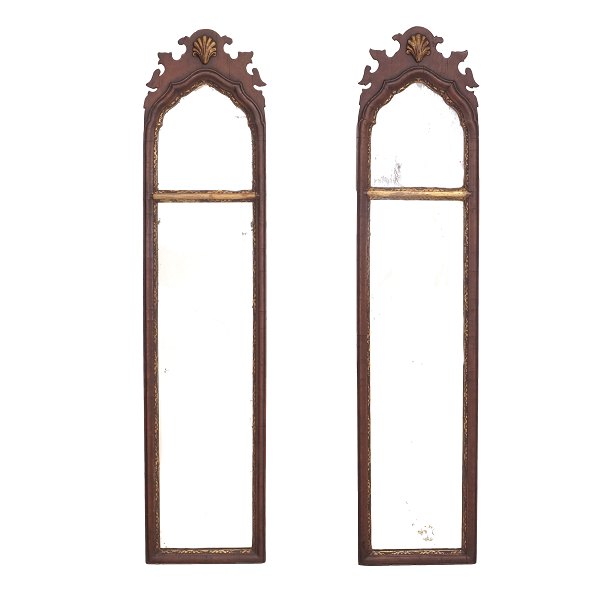 Pair of Baroque partly gilt mahogany mirrors. Northgermany circa 1750. Size: 
90x21cm