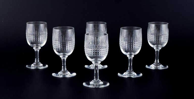 Baccarat, France. A set of six "Nancy" white wine glasses in clear crystal glass.