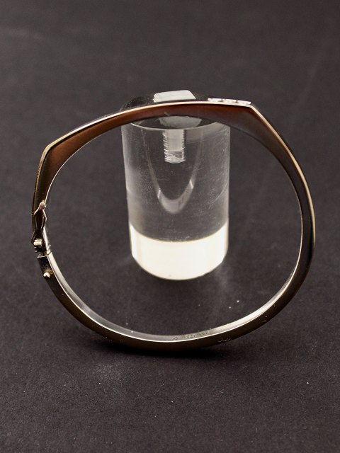 14 carat white gold bangle with 3 diamonds