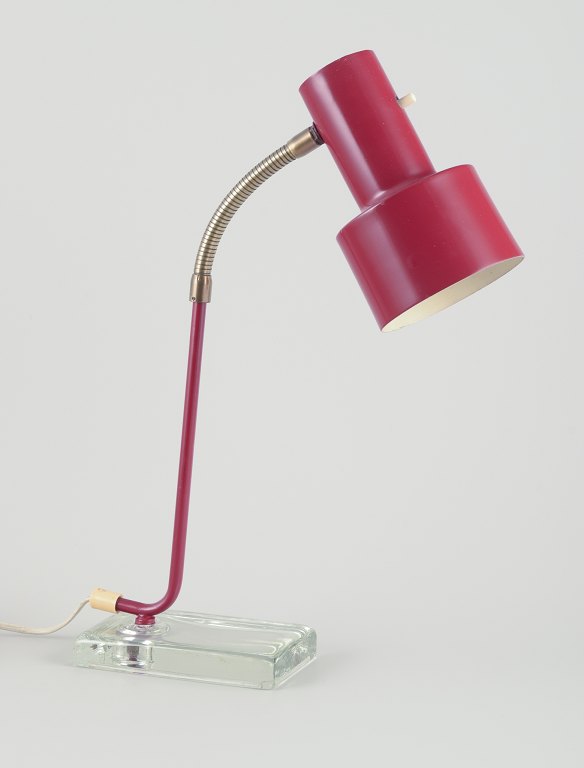 Swedish designer.Retro table lamp in red lacquered metal on glass base.