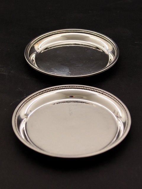 A pair of sterling silver wine trays