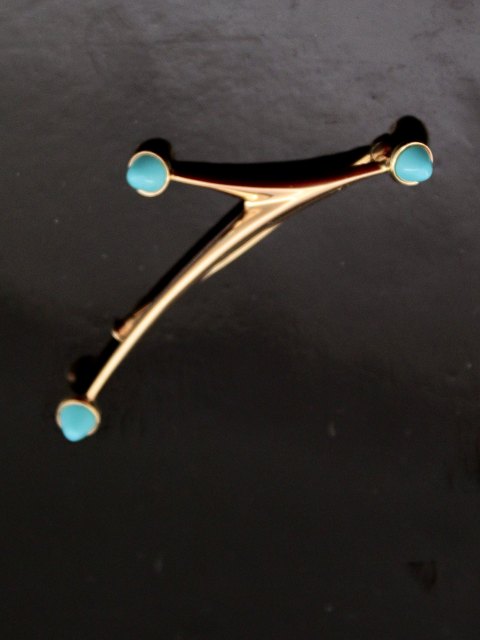 14 karat guld moderne broche med turkiser