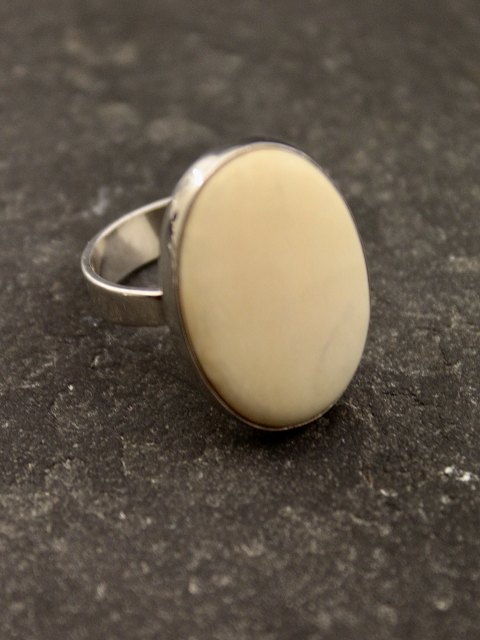 N E From sterling silver ring with bone