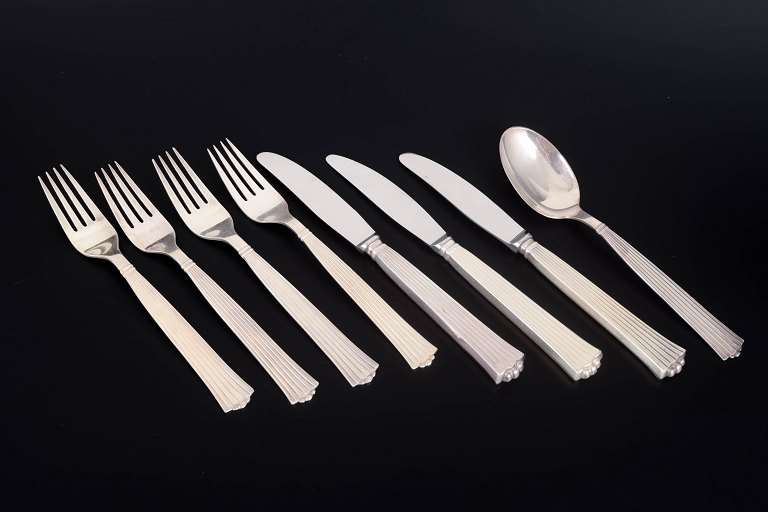 Raadvad, set of eight pieces of silver-plated dinner flatware.